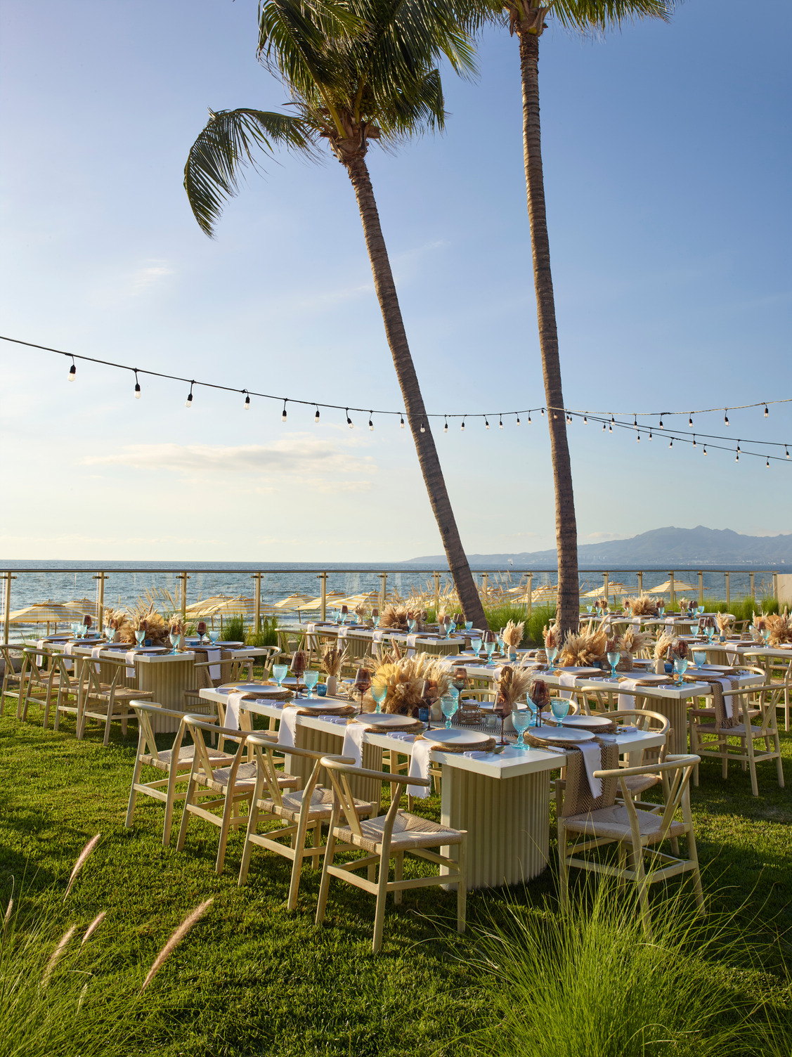 Pacific Garden event setup at UNICO 20°105° with tables facing the Riviera Nayarit sunset